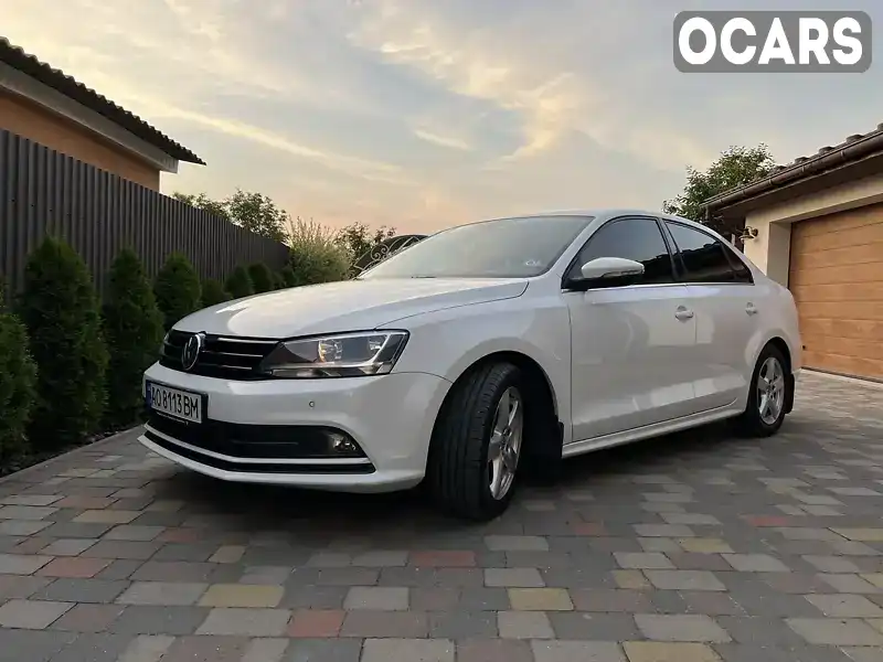 Седан Volkswagen Jetta 2016 1.6 л. Ручна / Механіка обл. Закарпатська, Мукачево - Фото 1/16