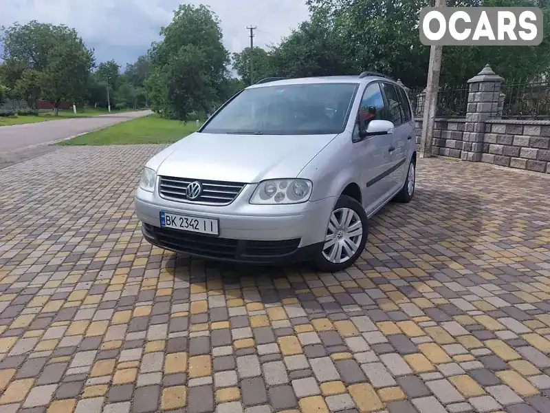 Мінівен Volkswagen Touran 2004 1.6 л. Ручна / Механіка обл. Рівненська, Здолбунів - Фото 1/21