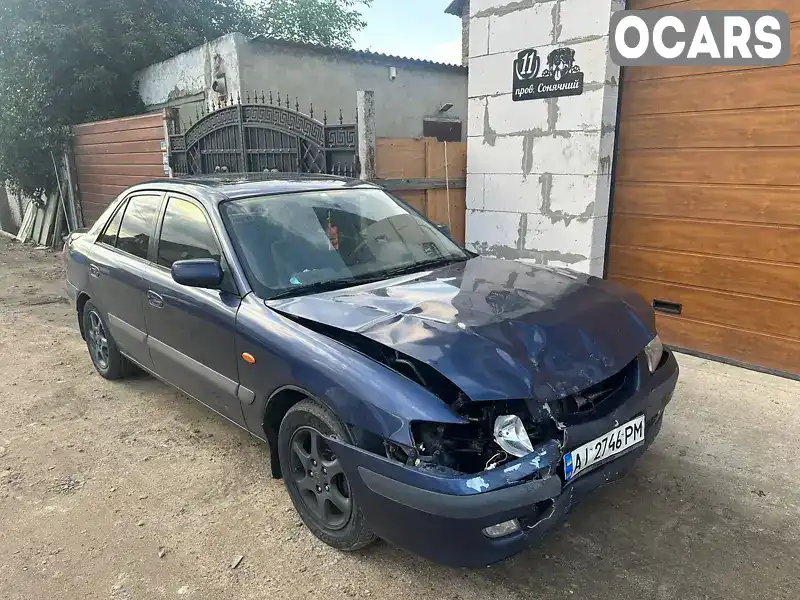 Седан Mazda 626 2002 2 л. Автомат обл. Одеська, Біляївка - Фото 1/21