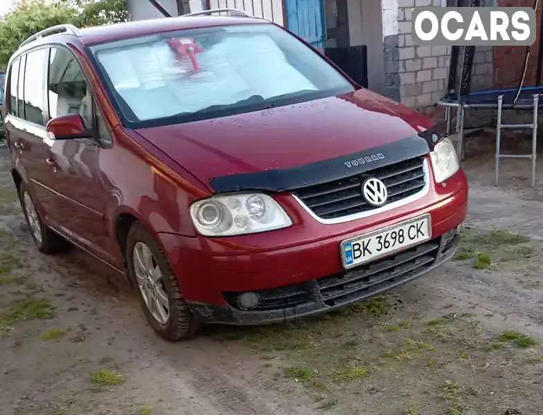 Мінівен Volkswagen Touran 2004 1.97 л. Ручна / Механіка обл. Рівненська, Дубровиця - Фото 1/13