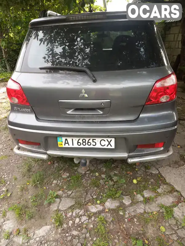 Внедорожник / Кроссовер Mitsubishi Outlander 2005 2 л. Ручная / Механика обл. Днепропетровская, Каменское (Днепродзержинск) - Фото 1/11