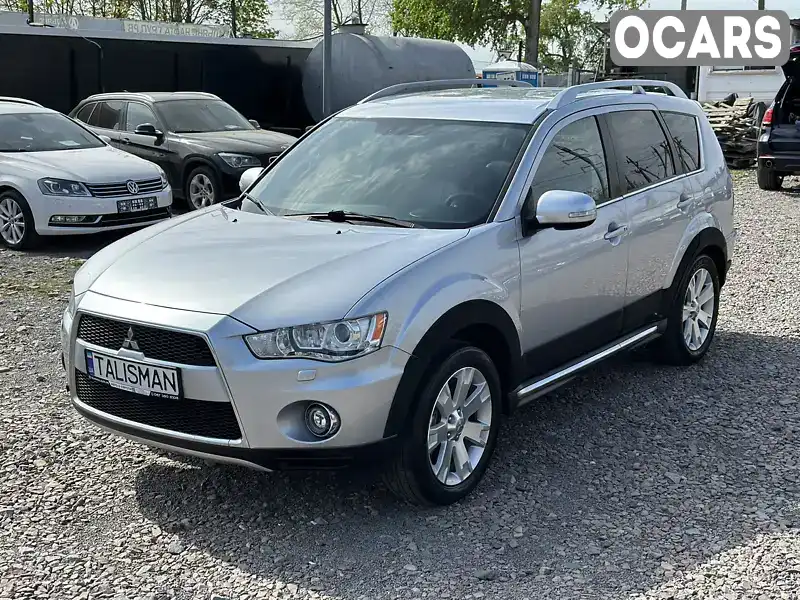 Внедорожник / Кроссовер Mitsubishi Outlander 2011 2.2 л. Автомат обл. Ровенская, Ровно - Фото 1/21