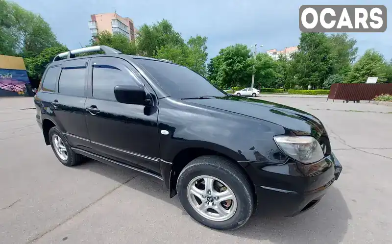 Позашляховик / Кросовер Mitsubishi Outlander 2004 2.4 л. Автомат обл. Харківська, Харків - Фото 1/7