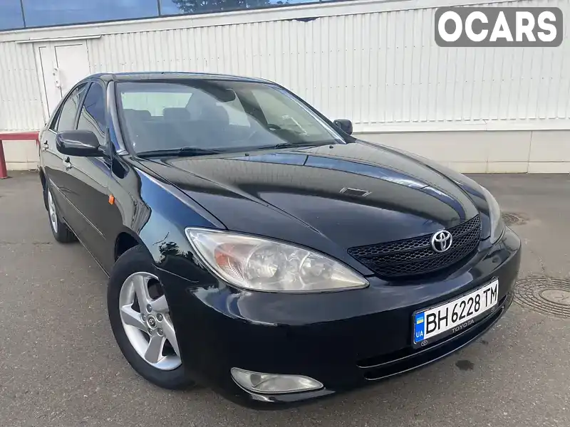 Седан Toyota Camry 2004 2.36 л. Автомат обл. Одеська, Білгород-Дністровський - Фото 1/21