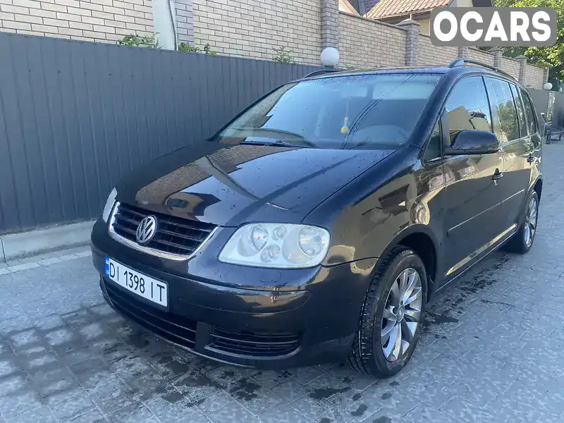 Минивэн Volkswagen Touran 2004 1.6 л. Ручная / Механика обл. Ивано-Франковская, Ивано-Франковск - Фото 1/16