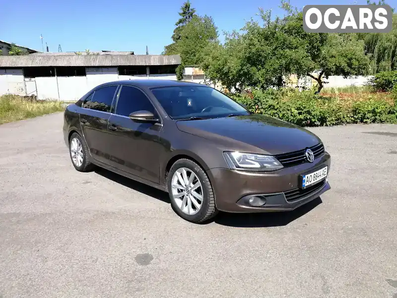 Седан Volkswagen Jetta 2012 1.97 л. Автомат обл. Закарпатська, Мукачево - Фото 1/18