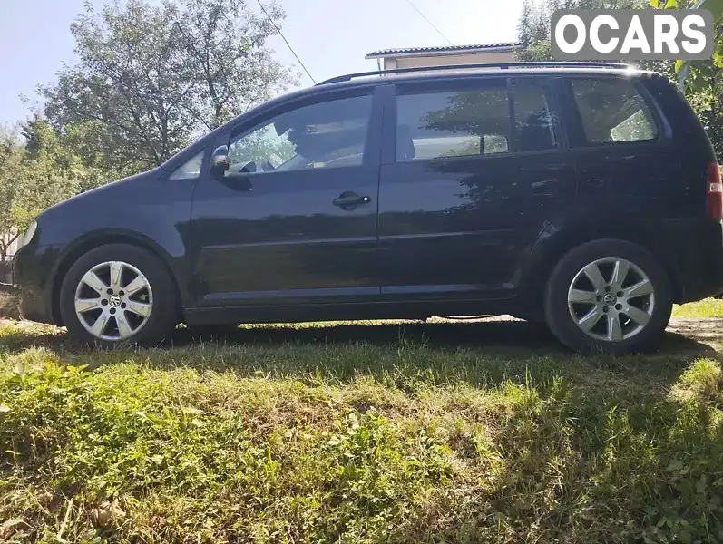 Мінівен Volkswagen Touran 2006 1.6 л. Ручна / Механіка обл. Закарпатська, Мукачево - Фото 1/14