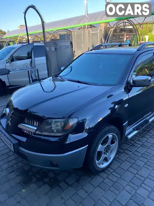 Внедорожник / Кроссовер Mitsubishi Outlander 2004 2 л. Ручная / Механика обл. Кировоградская, Кропивницкий (Кировоград) - Фото 1/10