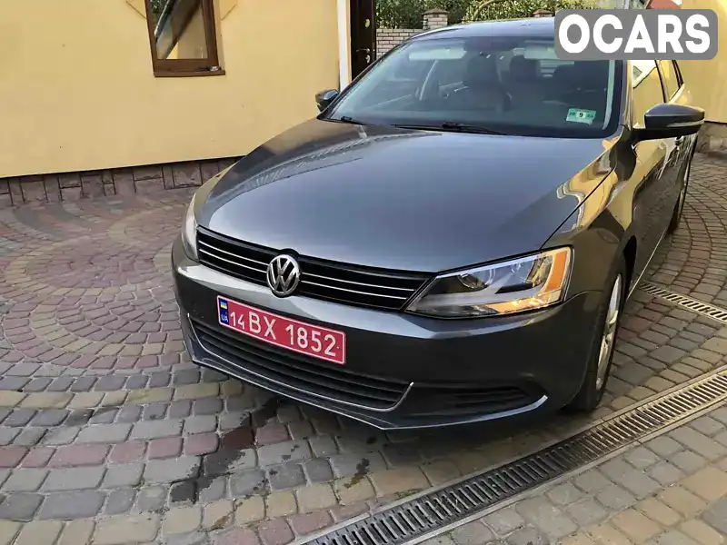 Седан Volkswagen Jetta 2013 2 л. Автомат обл. Львовская, Львов - Фото 1/21