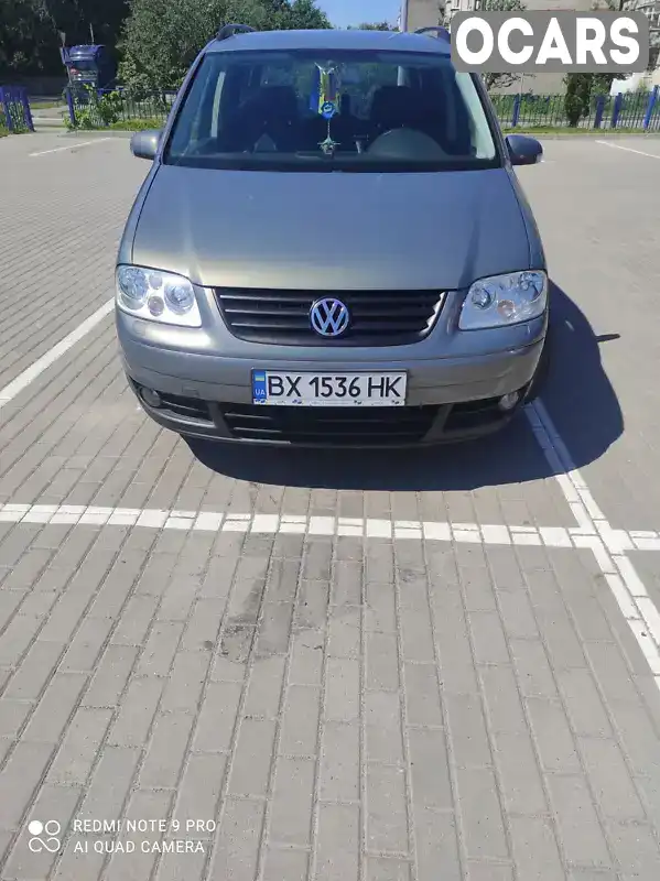 Мінівен Volkswagen Touran 2004 1.98 л. Ручна / Механіка обл. Хмельницька, Старокостянтинів - Фото 1/21