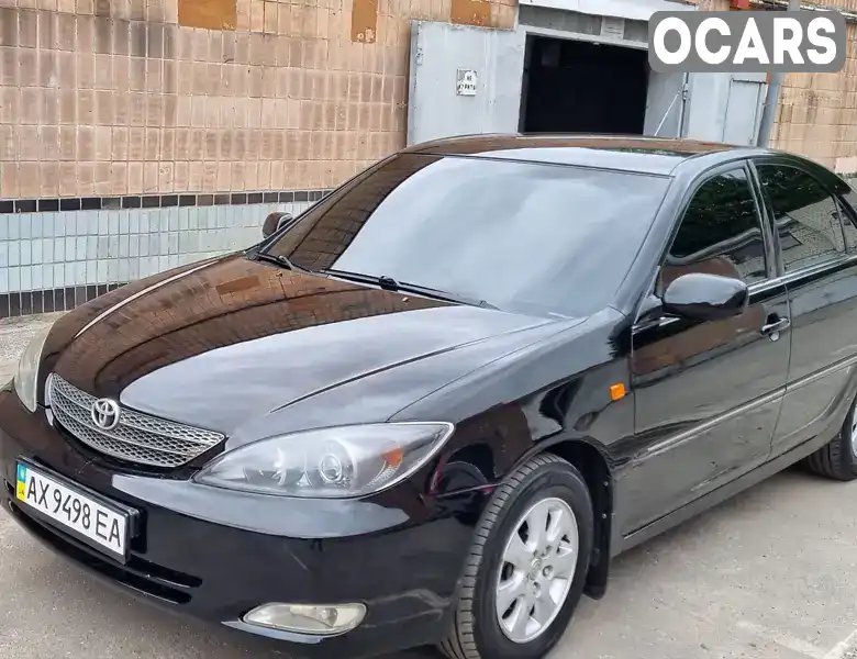 Седан Toyota Camry 2003 2.4 л. Ручна / Механіка обл. Харківська, Харків - Фото 1/21