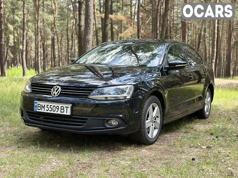 Седан Volkswagen Jetta 2014 1.6 л. Ручна / Механіка обл. Сумська, Суми - Фото 1/21