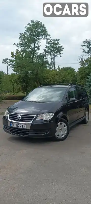 Мінівен Volkswagen Touran 2007 1.9 л. Ручна / Механіка обл. Дніпропетровська, Кривий Ріг - Фото 1/21