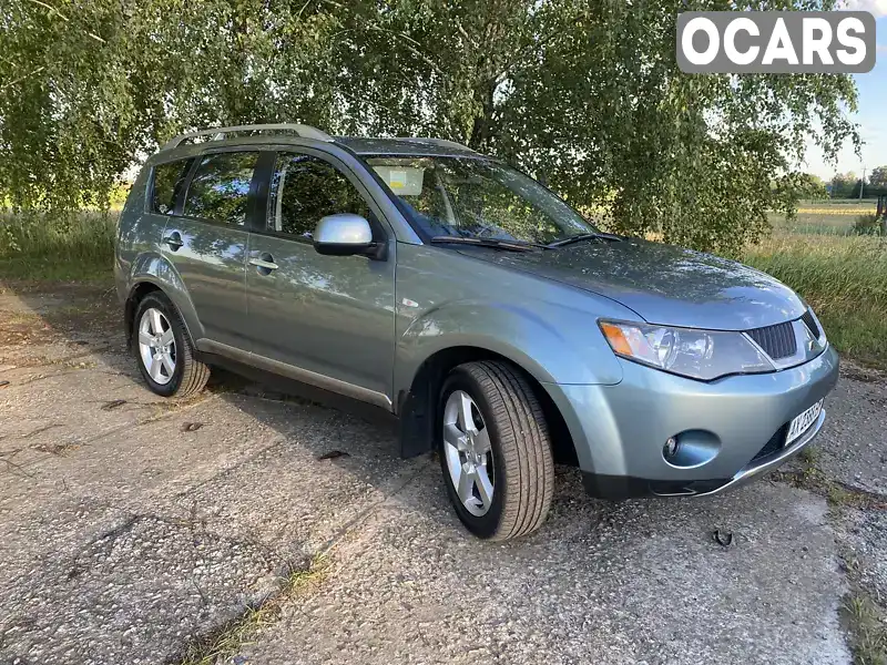 Позашляховик / Кросовер Mitsubishi Outlander XL 2008 2.4 л. Варіатор обл. Київська, Бориспіль - Фото 1/12