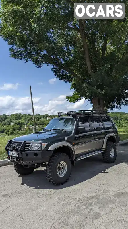 Позашляховик / Кросовер Nissan Patrol 1999 2.8 л. Ручна / Механіка обл. Хмельницька, Кам'янець-Подільський - Фото 1/18