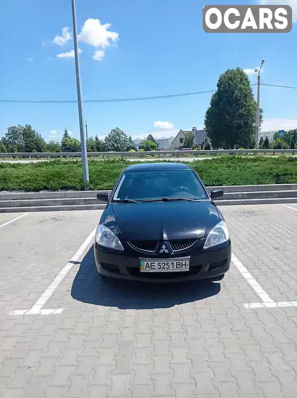 Седан Mitsubishi Lancer 2004 1.6 л. Ручна / Механіка обл. Дніпропетровська, Дніпро (Дніпропетровськ) - Фото 1/7