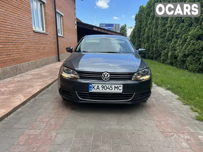 Седан Volkswagen Jetta 2013 2 л. Автомат обл. Київська, Київ - Фото 1/11