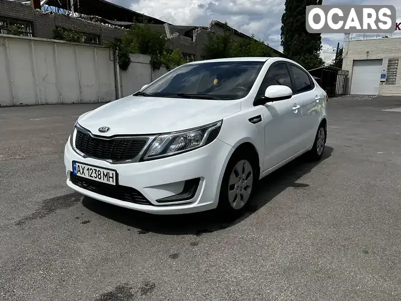 Седан Kia Rio 2013 1.4 л. Автомат обл. Харьковская, Харьков - Фото 1/21