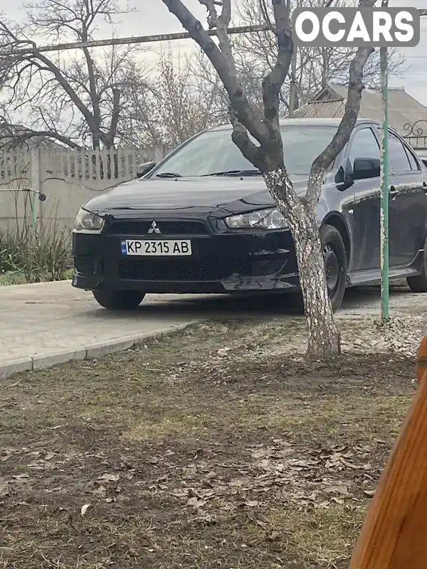 Седан Mitsubishi Lancer 2013 2 л. Вариатор обл. Запорожская, Запорожье - Фото 1/21