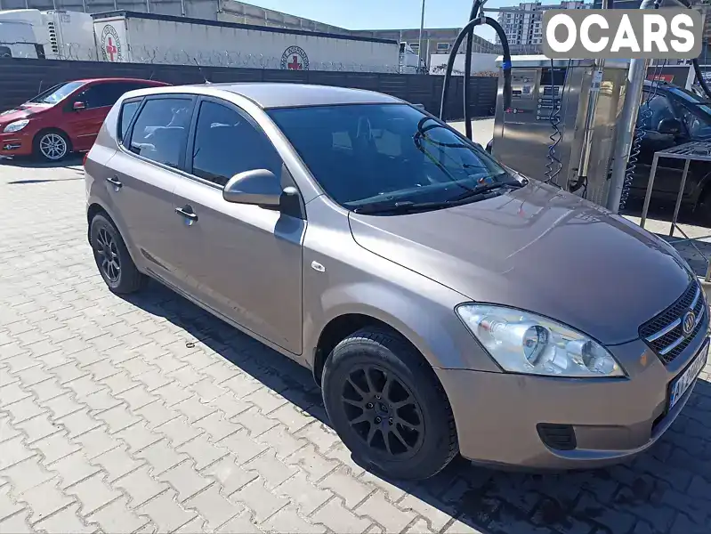 Хэтчбек Kia Ceed 2007 1.4 л. Ручная / Механика обл. Киевская, Вышневое - Фото 1/16