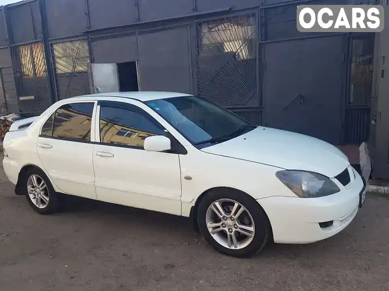 Седан Mitsubishi Lancer 2006 2 л. Автомат обл. Житомирська, Житомир - Фото 1/16