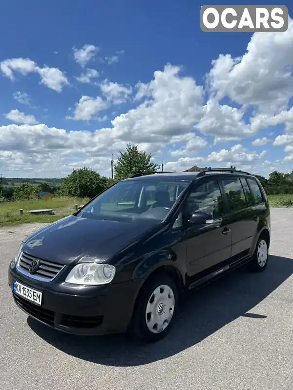 Мінівен Volkswagen Touran 2004 1.9 л. Ручна / Механіка обл. Вінницька, Вінниця - Фото 1/21