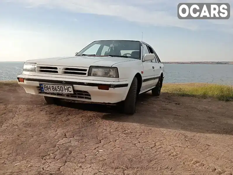 Седан Nissan Bluebird 1990 2 л. Ручная / Механика обл. Одесская, Одесса - Фото 1/19