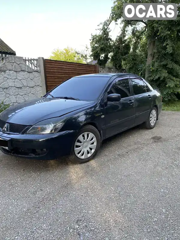 Седан Mitsubishi Lancer 2007 1.6 л. Ручная / Механика обл. Кировоградская, Онуфриевка - Фото 1/7