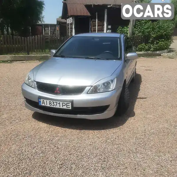 Седан Mitsubishi Lancer 2007 1.6 л. Ручная / Механика обл. Николаевская, location.city.berizky - Фото 1/14