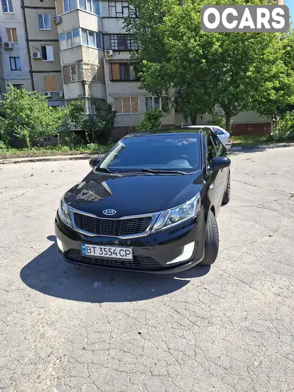 Седан Kia Rio 2012 1.4 л. Ручна / Механіка обл. Херсонська, Херсон - Фото 1/13