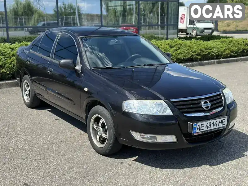 Седан Nissan Almera 2012 1.6 л. Ручна / Механіка обл. Дніпропетровська, Дніпро (Дніпропетровськ) - Фото 1/19