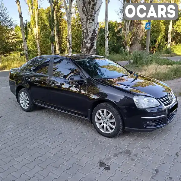 Седан Volkswagen Jetta 2008 1.9 л. Ручна / Механіка обл. Запорізька, Запоріжжя - Фото 1/17