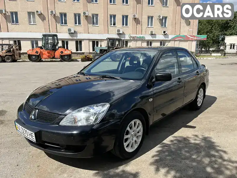 Седан Mitsubishi Lancer 2008 1.6 л. Ручна / Механіка обл. Полтавська, Полтава - Фото 1/17