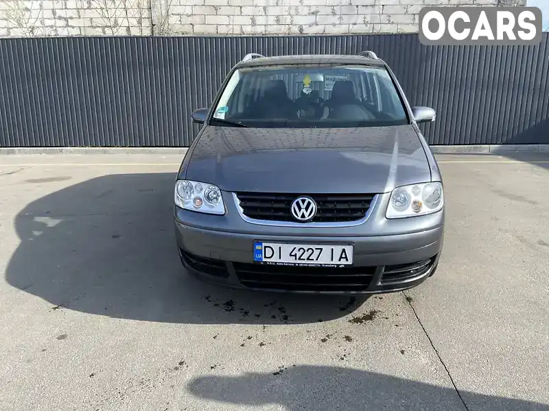 Мінівен Volkswagen Touran 2006 1.6 л. Ручна / Механіка обл. Дніпропетровська, Дніпро (Дніпропетровськ) - Фото 1/14