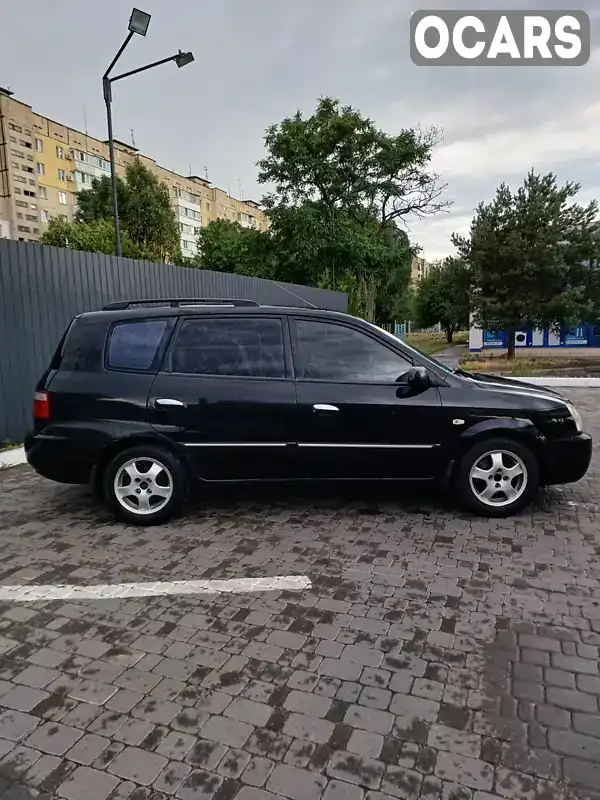 Минивэн Kia Carens 2004 1.99 л. Автомат обл. Днепропетровская, Днепр (Днепропетровск) - Фото 1/14