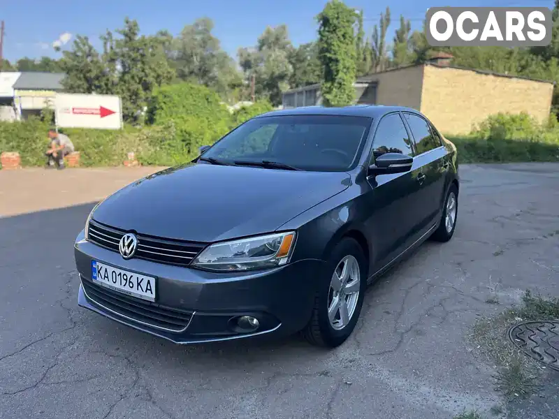 Седан Volkswagen Jetta 2014 1.8 л. Автомат обл. Київська, Київ - Фото 1/16