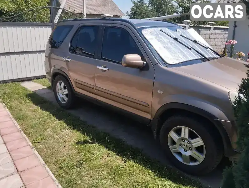 Внедорожник / Кроссовер Honda CR-V 2004 2 л. Автомат обл. Ивано-Франковская, Ивано-Франковск - Фото 1/7