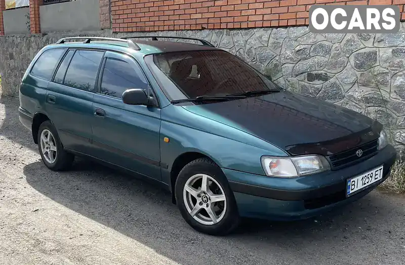 Седан Toyota Carina 1995 1.59 л. Ручная / Механика обл. Полтавская, Великая Багачка - Фото 1/12