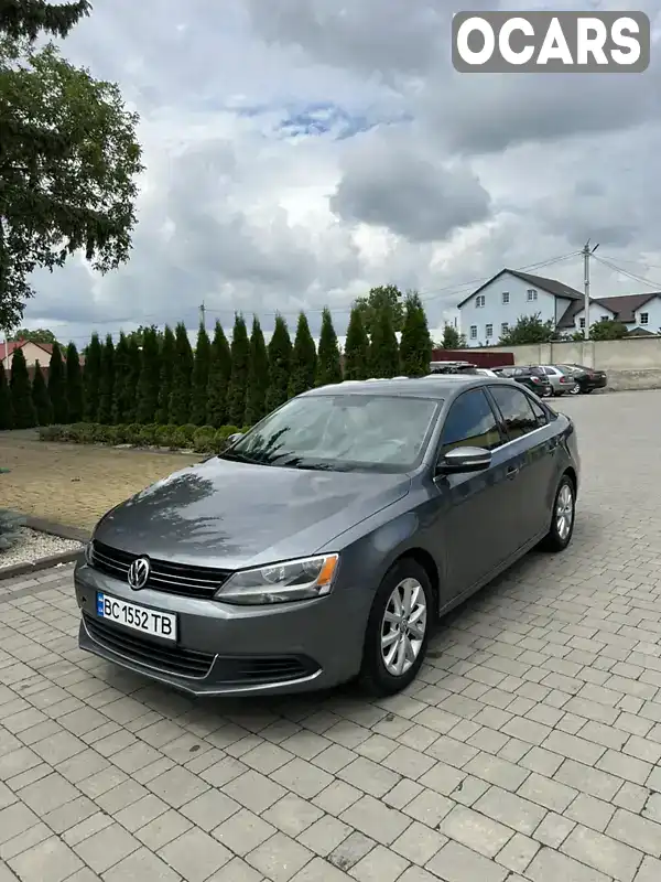 Седан Volkswagen Jetta 2014 1.8 л. Автомат обл. Львівська, Львів - Фото 1/13