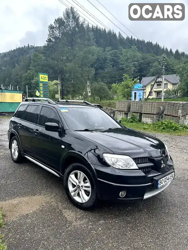 Внедорожник / Кроссовер Mitsubishi Outlander 2008 2.38 л. Автомат обл. Ивано-Франковская, Верховина - Фото 1/21