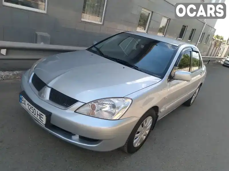 Седан Mitsubishi Lancer 2009 1.6 л. Ручна / Механіка обл. Кіровоградська, Кропивницький (Кіровоград) - Фото 1/21