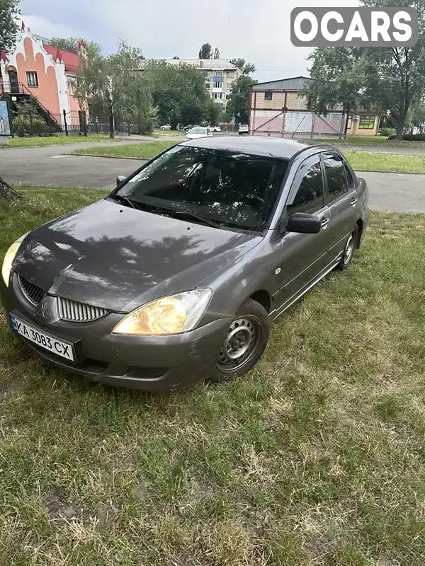 Седан Mitsubishi Lancer 2004 1.58 л. Ручна / Механіка обл. Київська, Київ - Фото 1/5