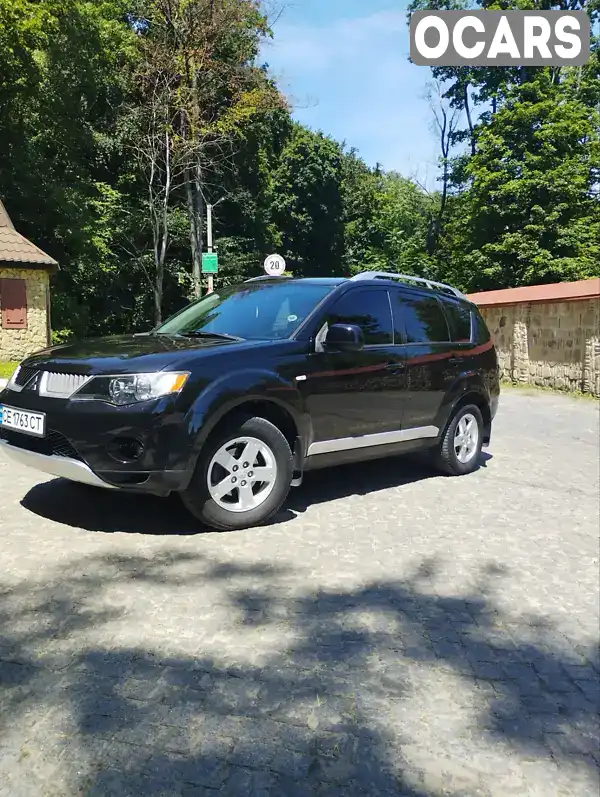 Позашляховик / Кросовер Mitsubishi Outlander XL 2008 2.4 л. Варіатор обл. Чернівецька, Чернівці - Фото 1/16