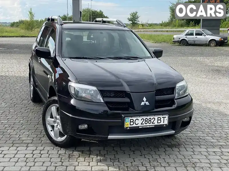 Внедорожник / Кроссовер Mitsubishi Outlander Sport 2008 2.4 л. Автомат обл. Львовская, Стрый - Фото 1/21