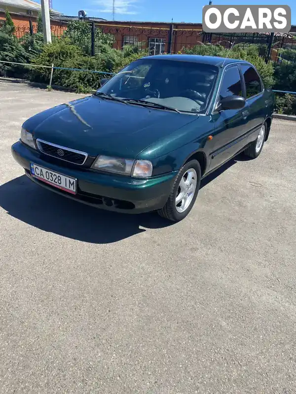 Седан Suzuki Baleno 1998 1.6 л. Ручная / Механика обл. Черкасская, Черкассы - Фото 1/12