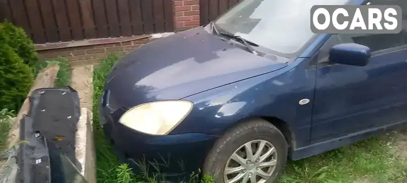 Універсал Mitsubishi Lancer 2004 1.6 л. Ручна / Механіка обл. Дніпропетровська, Дніпро (Дніпропетровськ) - Фото 1/8