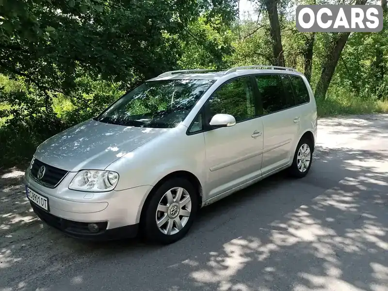 Минивэн Volkswagen Touran 2004 1.98 л. Автомат обл. Киевская, Киев - Фото 1/14