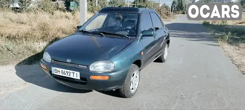 Седан Mazda 121 1993 1.32 л. Ручна / Механіка обл. Одеська, Одеса - Фото 1/21