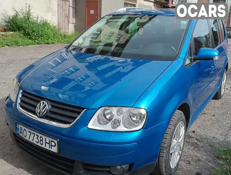 Мінівен Volkswagen Touran 2005 1.9 л. Ручна / Механіка обл. Закарпатська, Міжгір'я - Фото 1/18