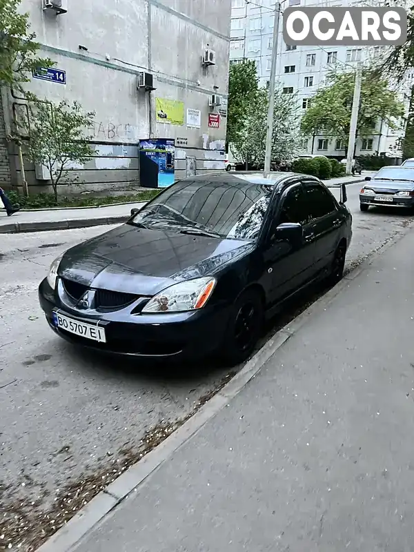 Седан Mitsubishi Lancer 2004 2 л. Автомат обл. Харківська, Харків - Фото 1/9